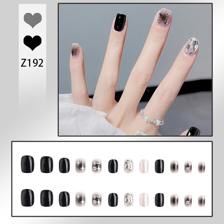 Artificial nail set with glamorous glitter and crystal decorations Bowlift