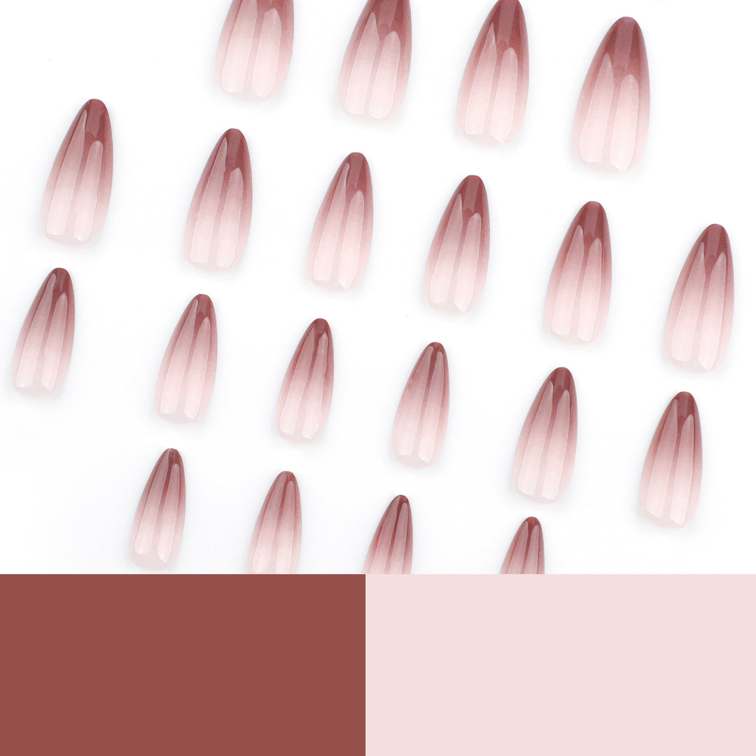 Artistic stiletto nails with elegant ombre design Bowlift