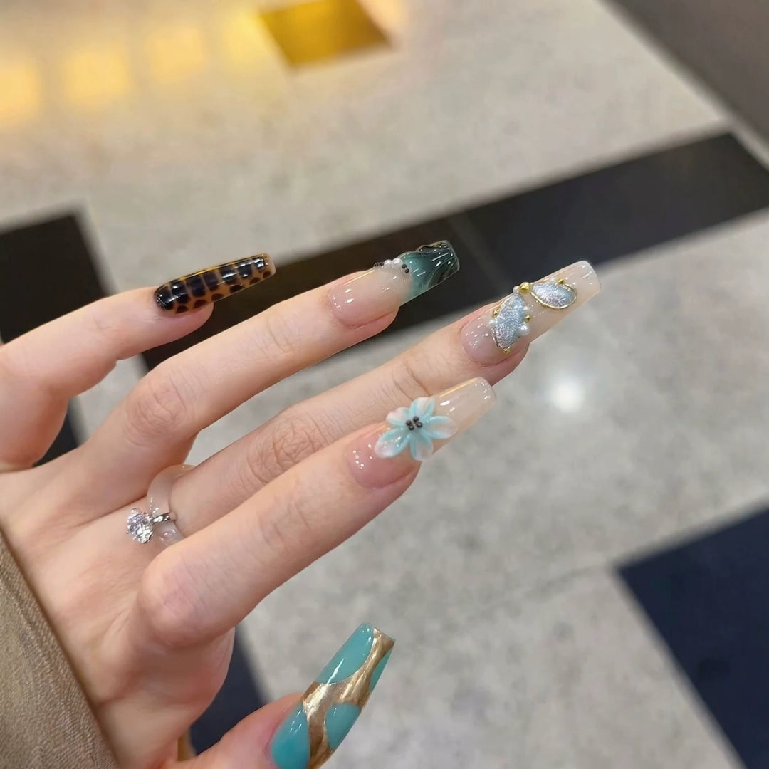 Artistic Press-On Nail Art Set with Floral and Geometric Designs Bowlift