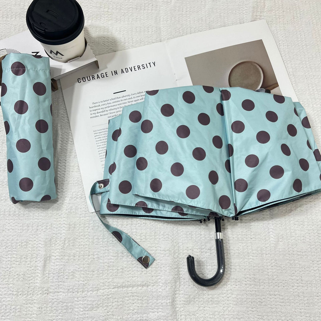 Women Folding Umbrella Bowlift
