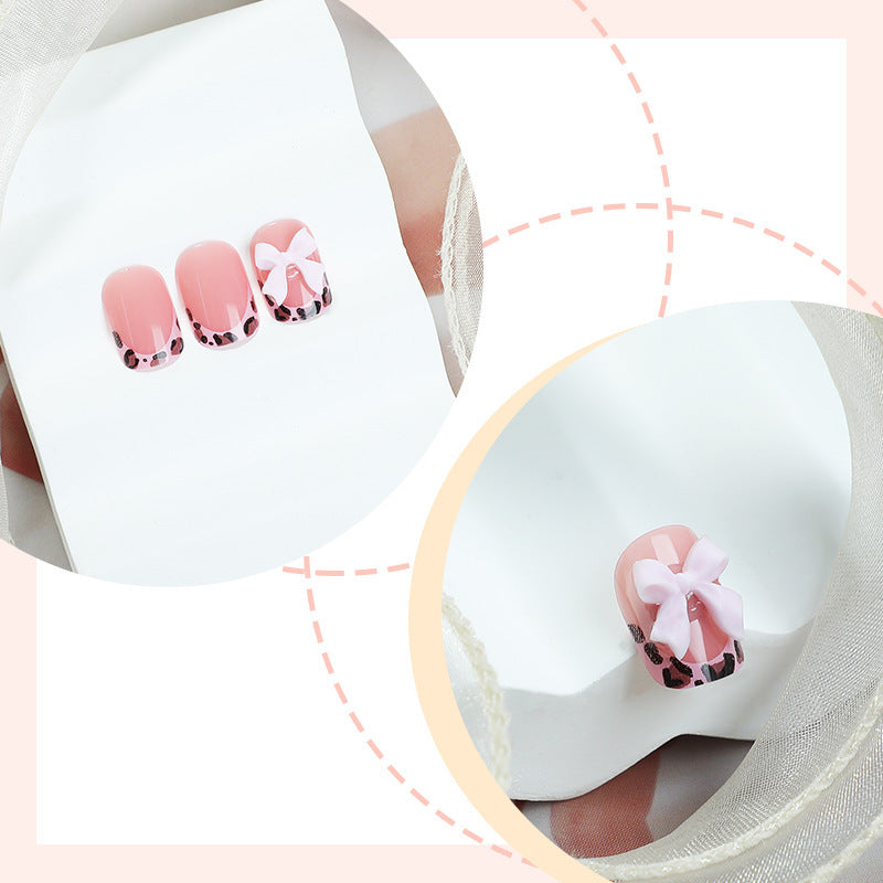Artifical Nail Set with Elegant Paw and Bow Accents Bowlift