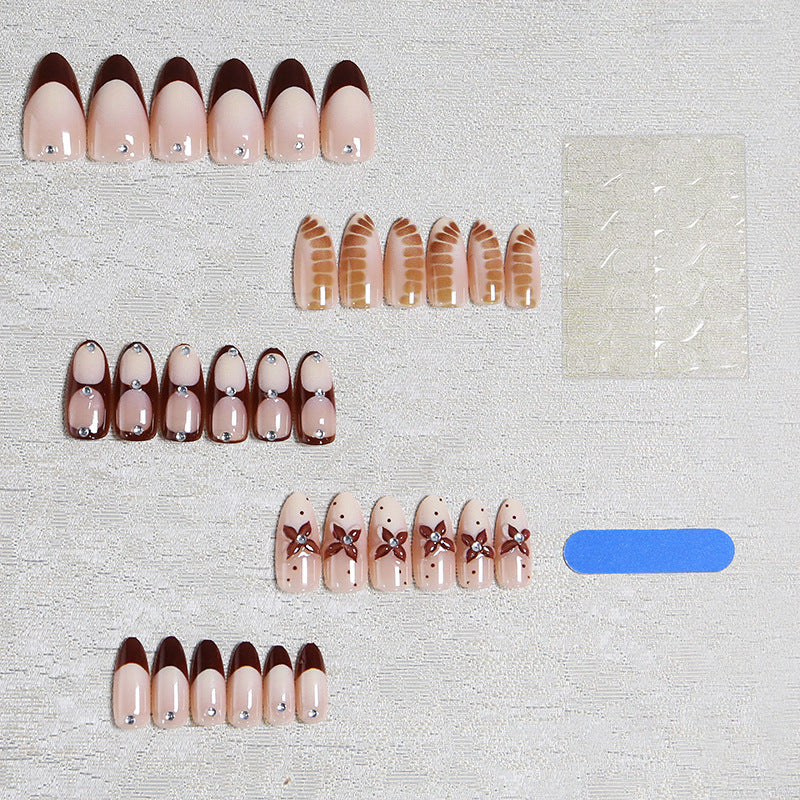 Artificial nails with elegant motif designs Bowlift