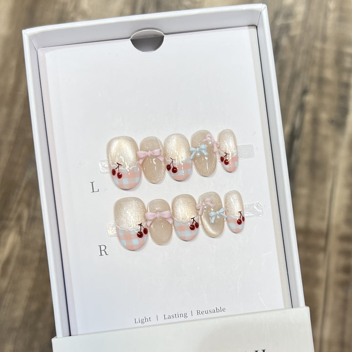 Decorative Press-On Nail Art Set with Charming Bow and Cherry Accents Bowlift