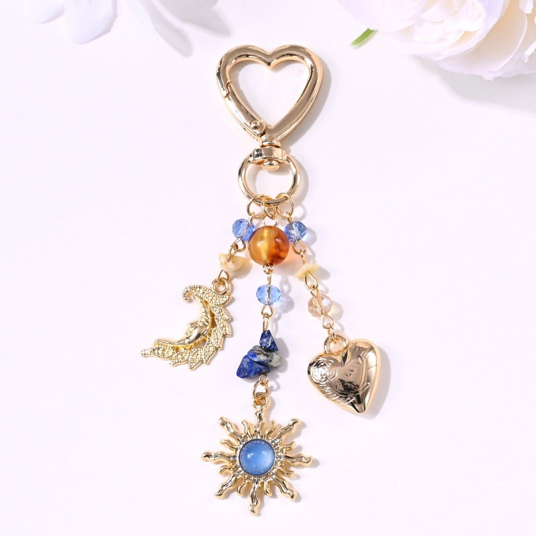 Keychain with Sparkling Sun Motif Bowlift