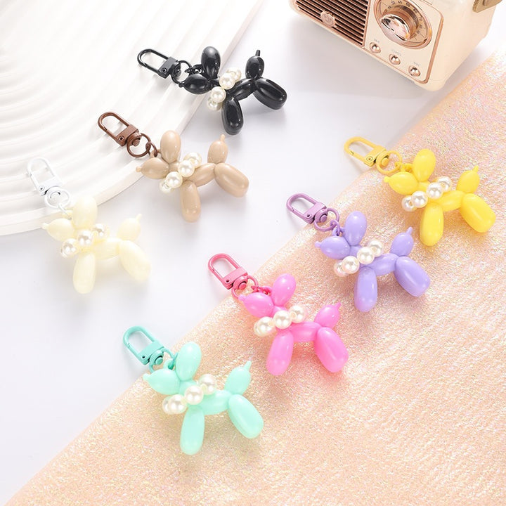 Playful keychain with balloon dog and beads Bowlift
