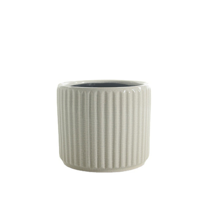 Elegant ceramic flower pot with ribbed structure Bowlift