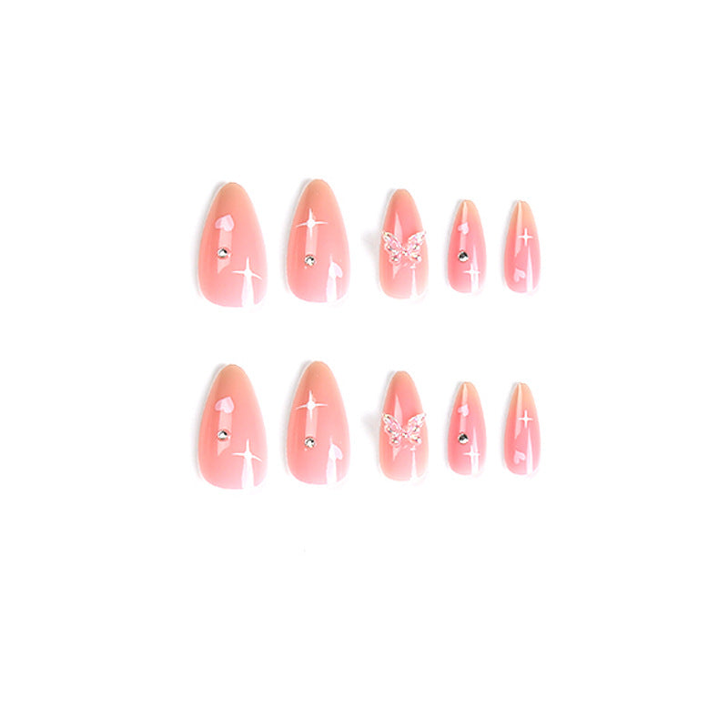 Artful nail art with heart motifs and glitter accents Bowlift