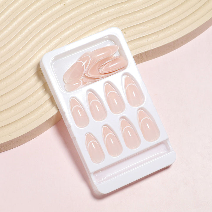 Almond-Shaped Press-On Nails with Elegantly Curved French Tips Bowlift