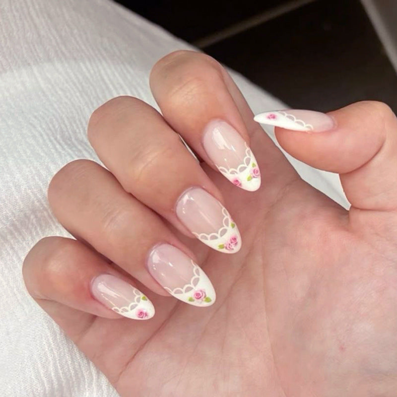 Artful Nail Art with Flower Design and Blue French Tip Bowlift
