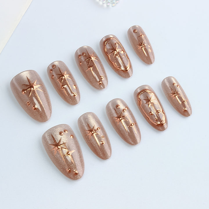 Glamorous Gel Nail Art with Golden Accents Bowlift