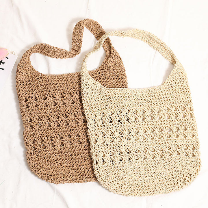Crocheted shoulder bag with decorative hole pattern Bowlift