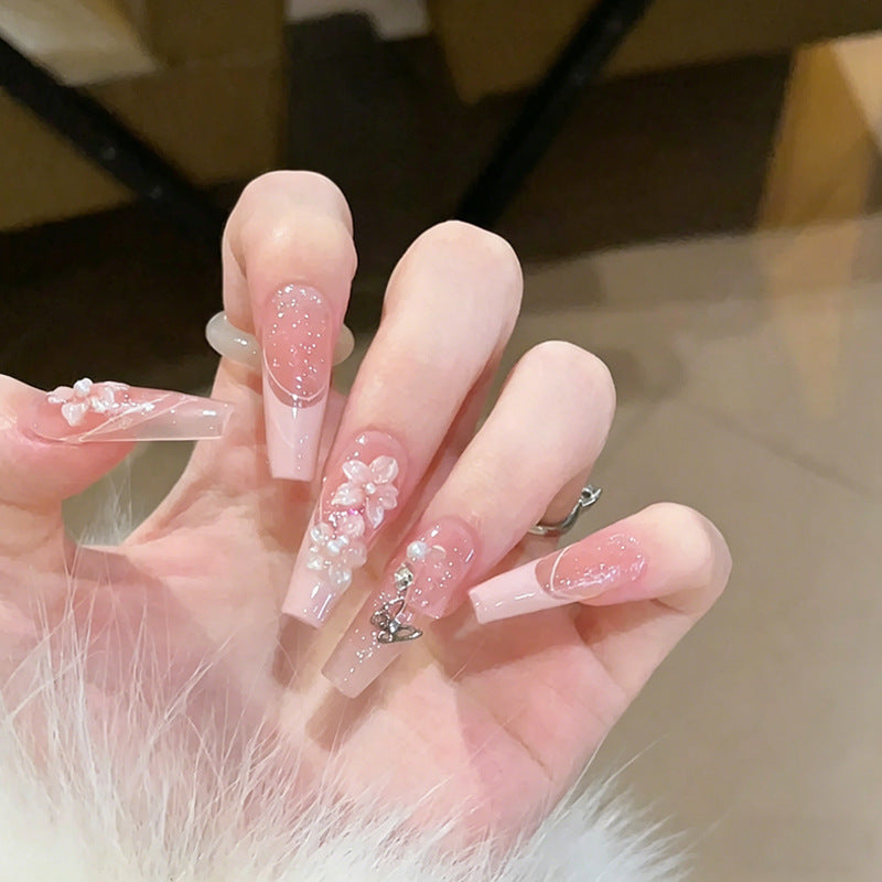 Artificial nail set with sparkling glitter accents Bowlift