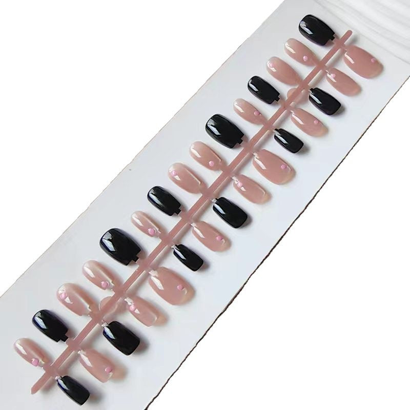 Artificial nails in elegant black-pink design Bowlift