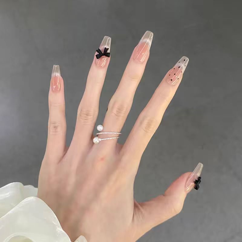 Artistic Long Stiletto Press-On Nails with Bow Accents Bowlift