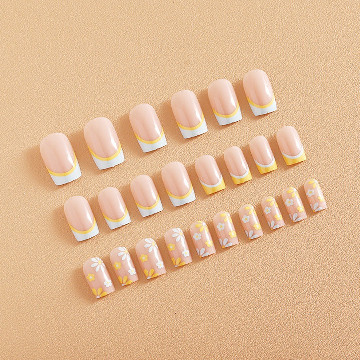 Nail art set with creative floral designs and elegant French finish Bowlift