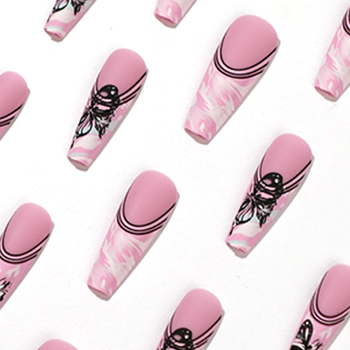 Artificial nail art with delicate butterfly designs Bowlift