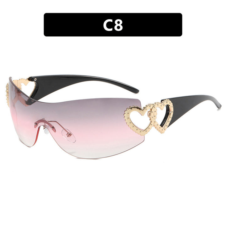 Ladies sporty sunglasses in trendy shield design with heart accents Bowlift