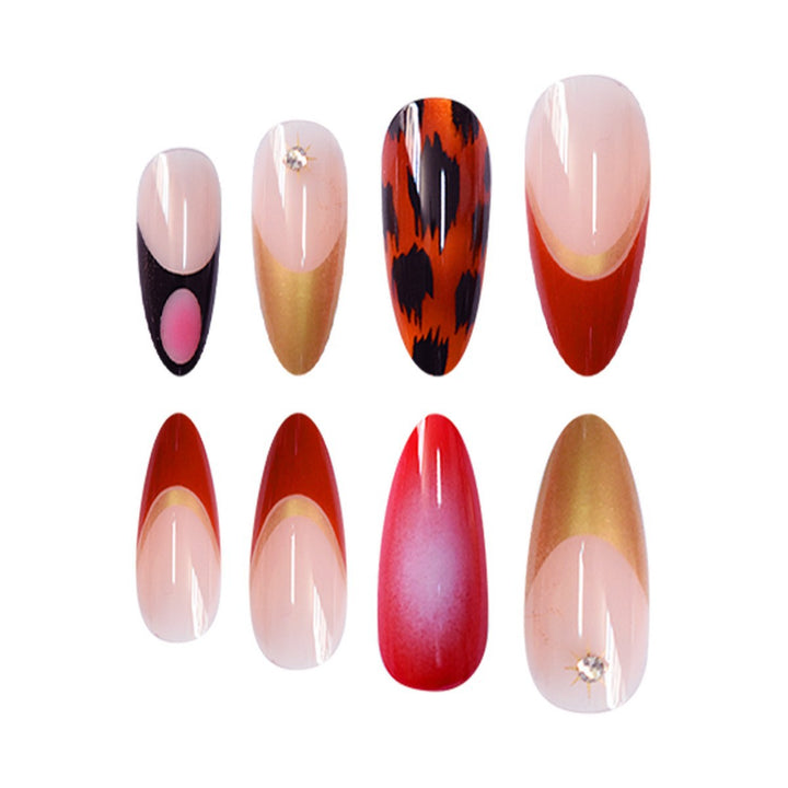 Artistic Stiletto Press-On Nails with Metallic Accents Bowlift