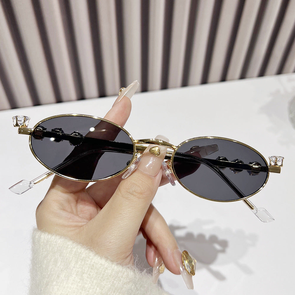 Fashion-Forward Oval Sunglasses with Crystal Accents Bowlift