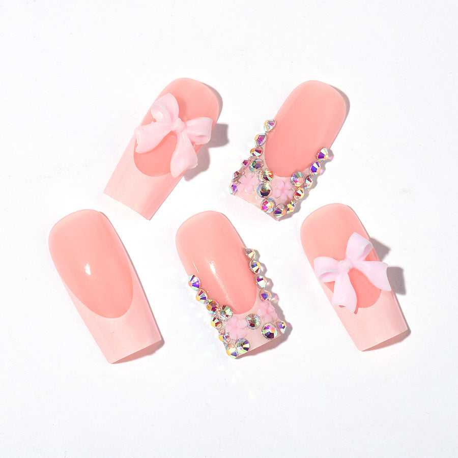 Artifical nail set with glamorous 3D bows and crystal embellishments Bowlift