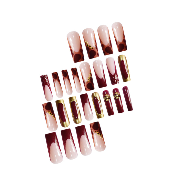 Artistic Long Press-On Nails with Elegant Accents Bowlift