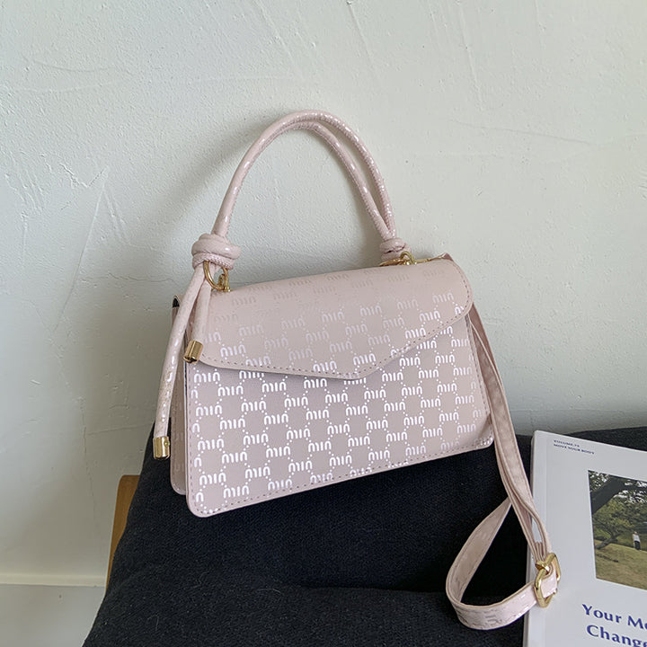 Elegant Monogrammed Handbag Bowlift