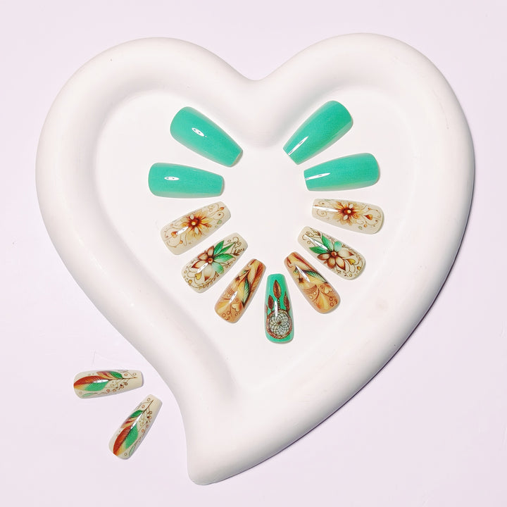Creative artificial nails with floral and dreamcatcher design elements Bowlift