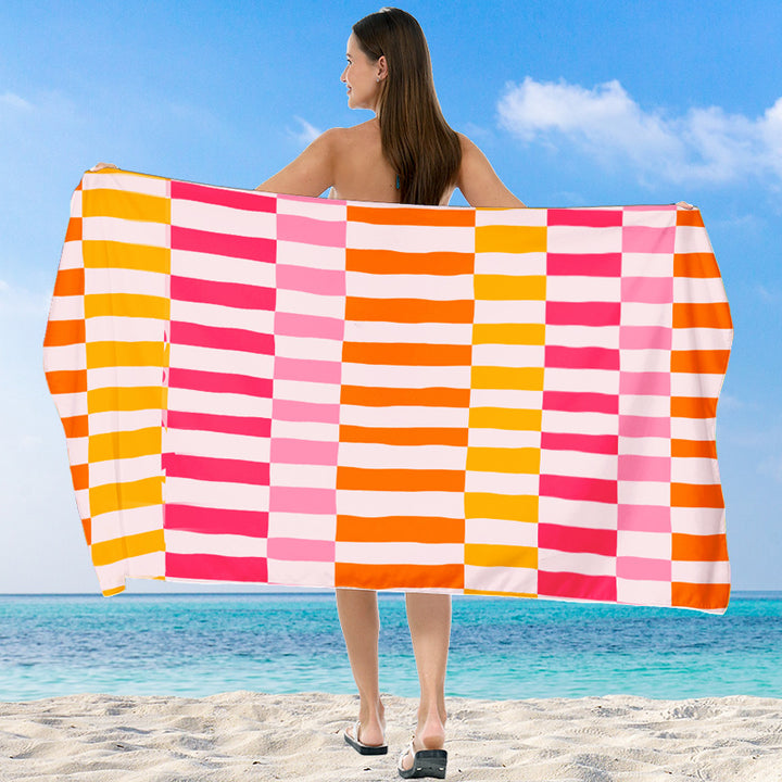 Beach towel with vibrant gradient color and stylish striped design Bowlift