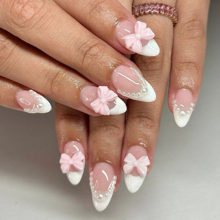 Artful acrylic nails with elegant floral accents Bowlift