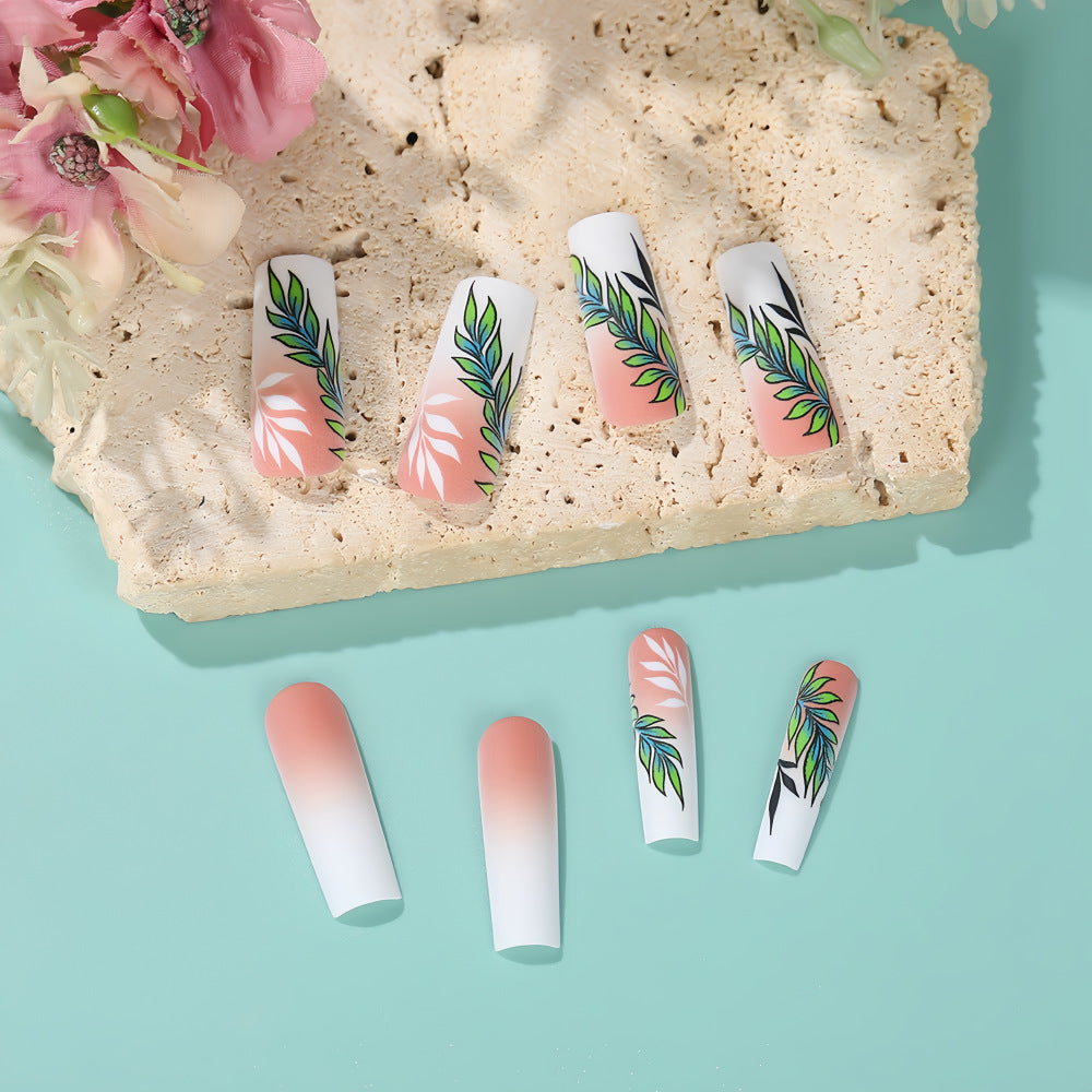 Artificial nails with elegant ombre design and floral accents Bowlift