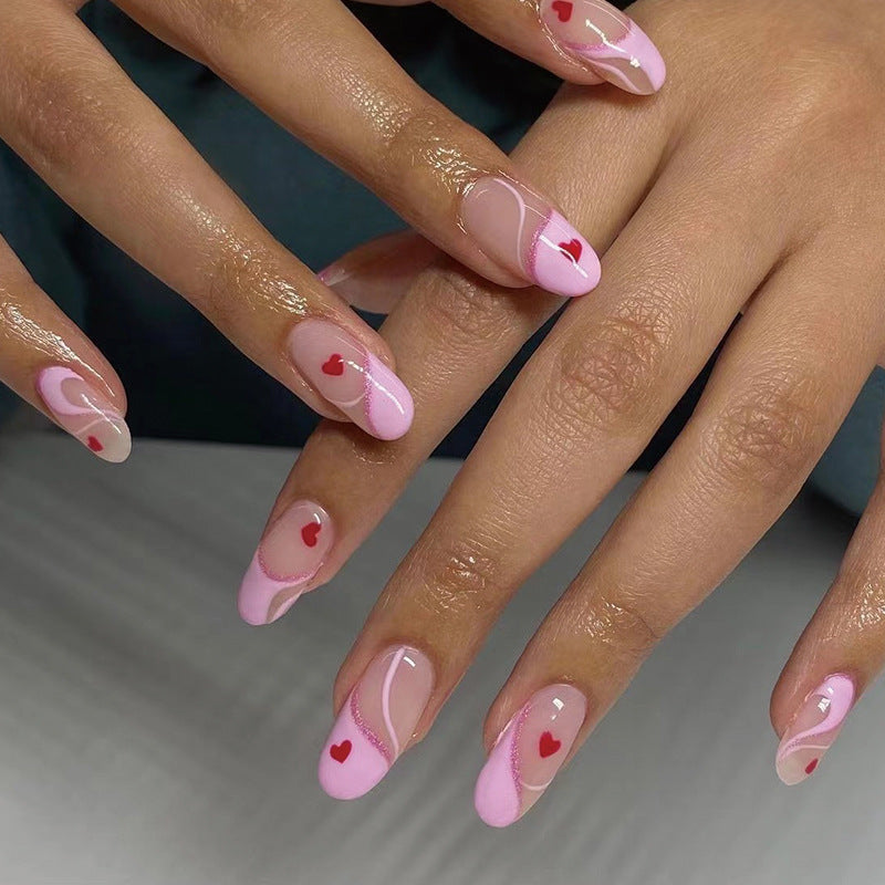 Artistic Nail Extensions with Heart Motif Bowlift