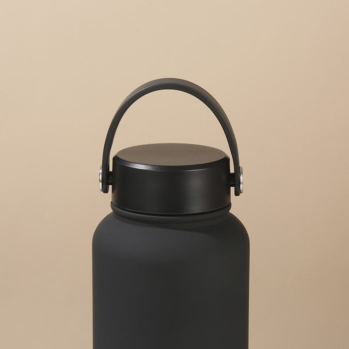 Women's insulated water bottle with ergonomic carrying handle Bowlift