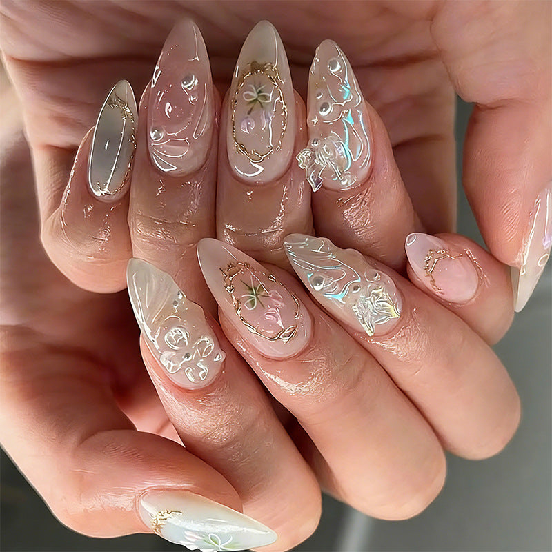 Elegant artificial nails with holographic and floral decorations Bowlift
