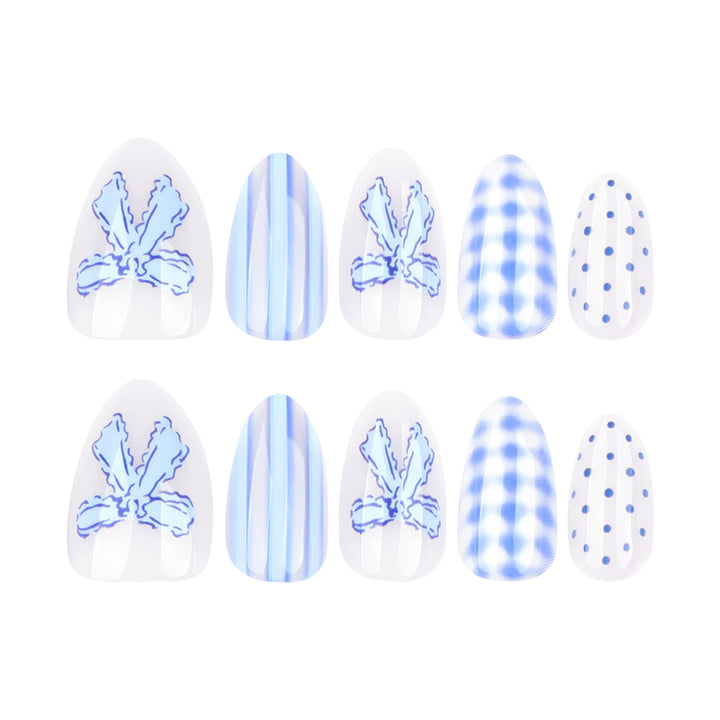 Artistic Nail Art with Floral and Polka Dot Designs Bowlift