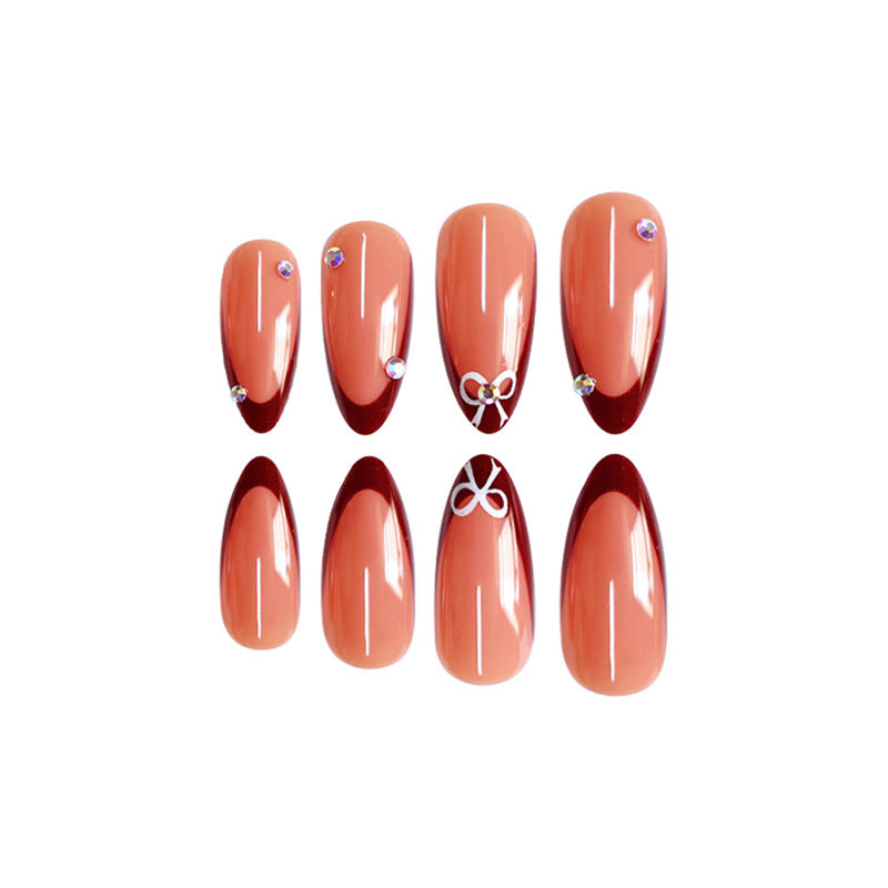 Artistic Stiletto Press-On Nails with Gemstone Accents Bowlift