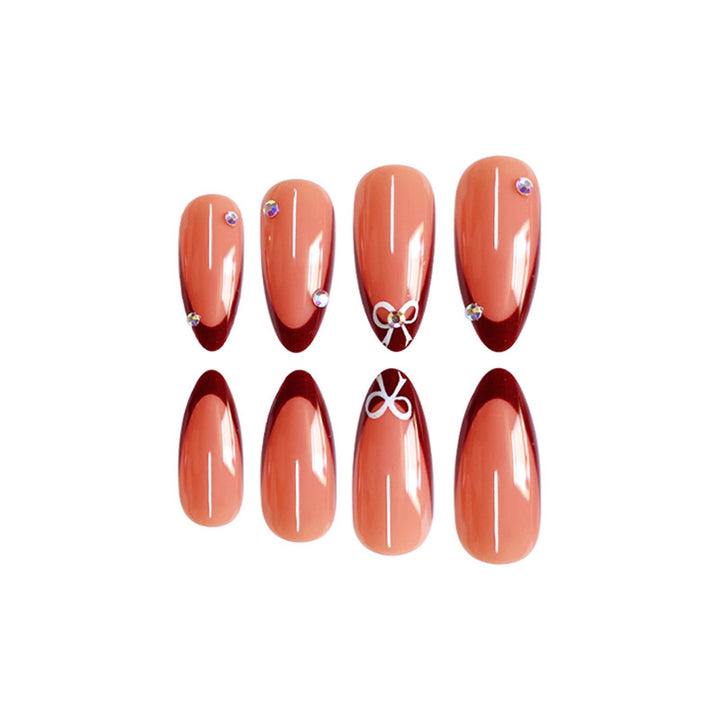 Artistic Stiletto Press-On Nails with Gemstone Accents Bowlift