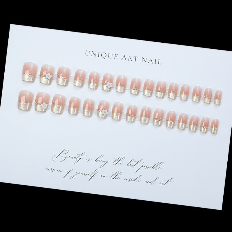Decorative Press-On Nail Extensions with Floral Accents Bowlift