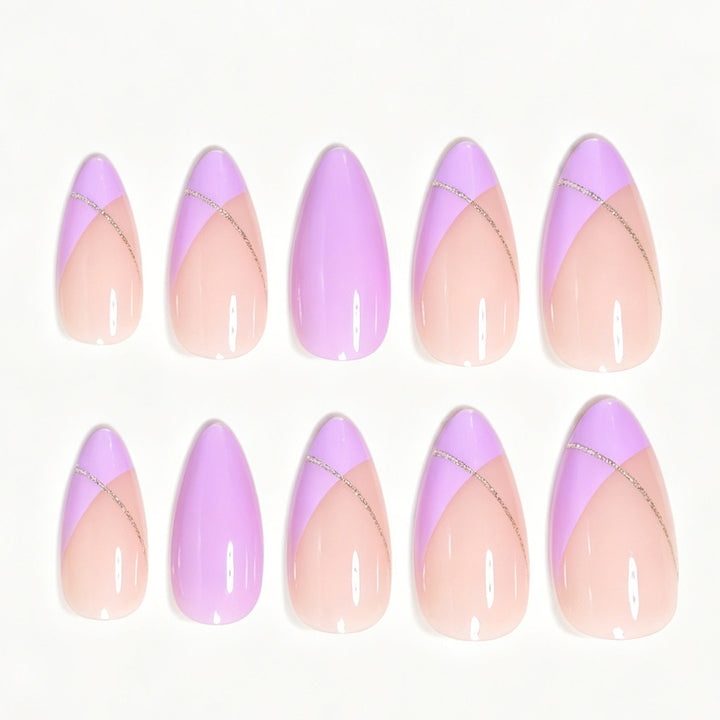 Stiletto Nail Art Tips with Gold Accents Bowlift