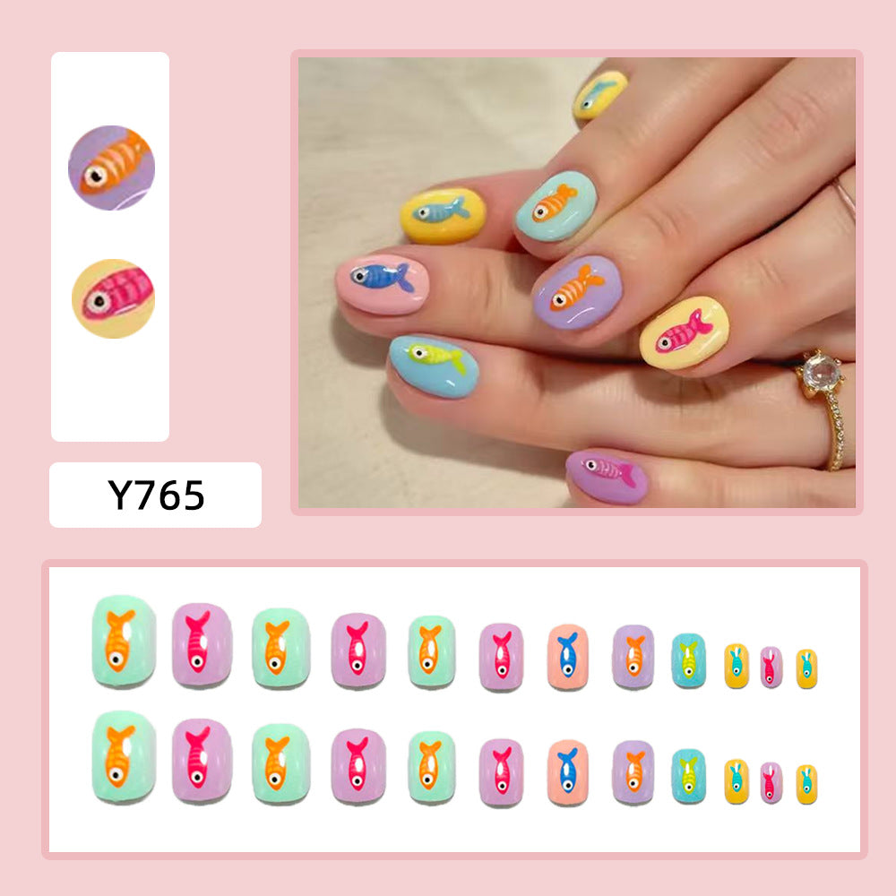 Creative artificial nails with playful fish design Bowlift
