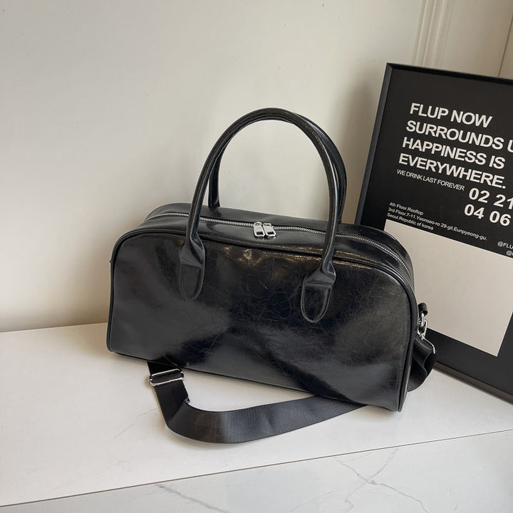 Elegant and Spacious Weekend Bag Made of High-Quality Synthetic Leather Bowlift