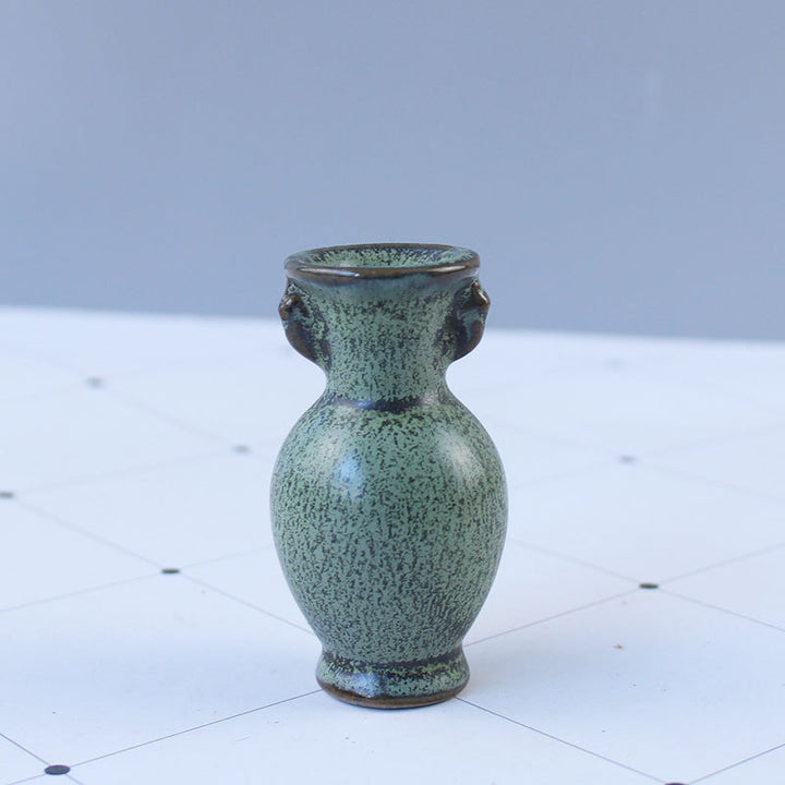 Elegant ceramic vase with artistic design Bowlift