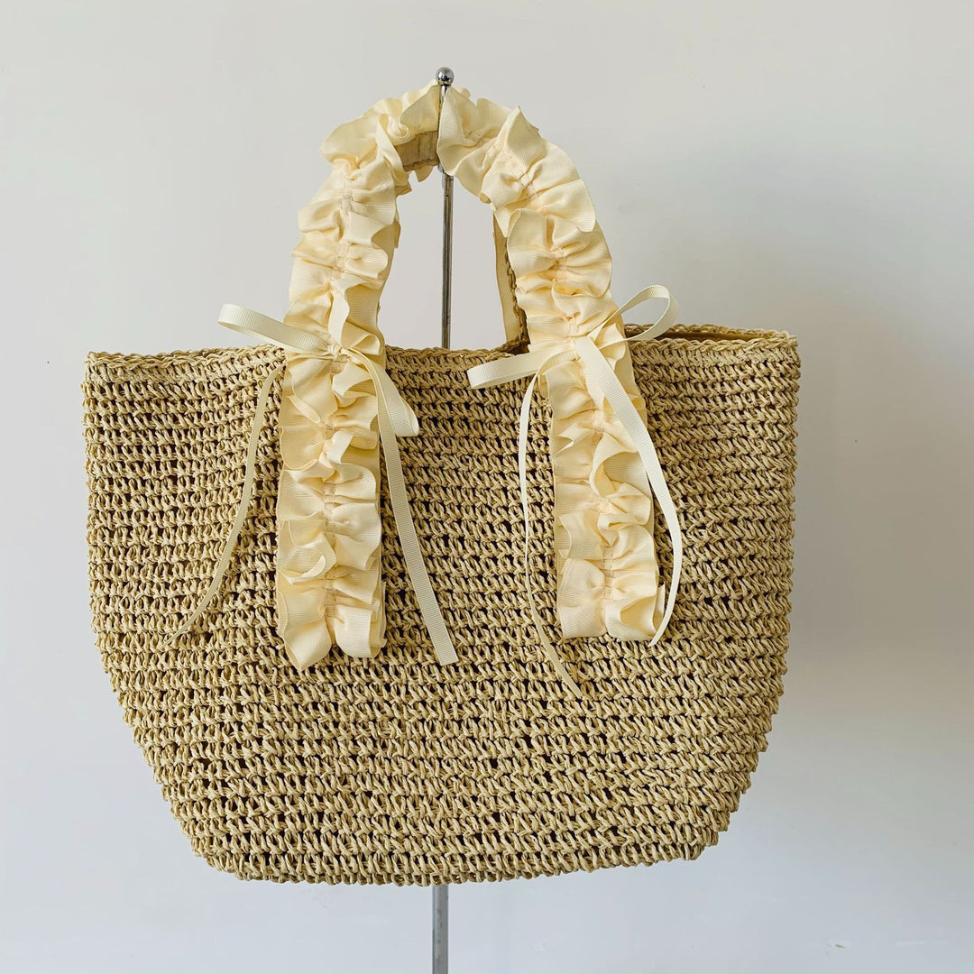 Crocheted beach bag with elegant satin accents Bowlift