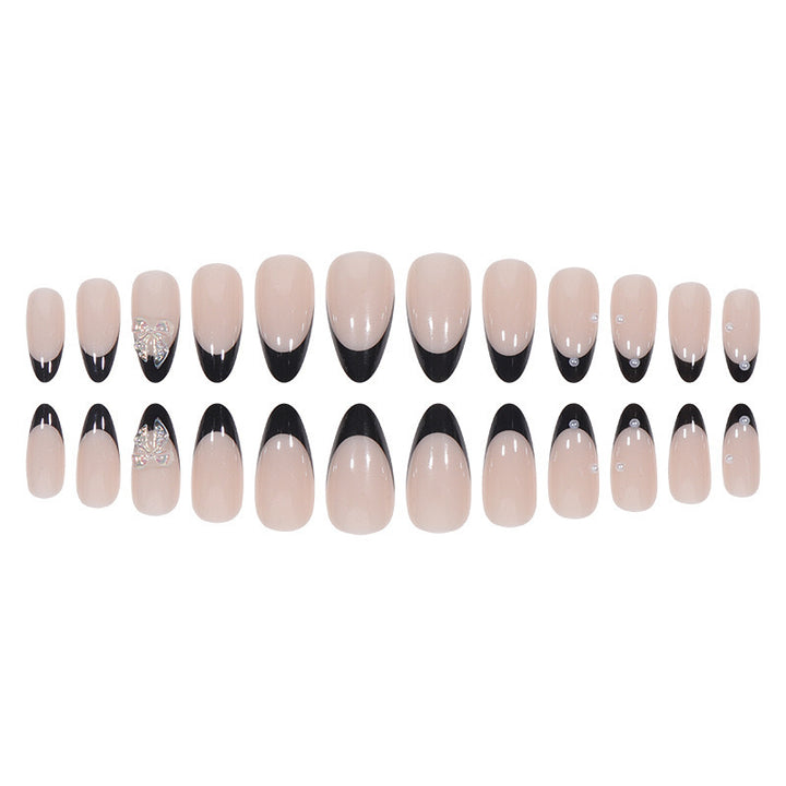 Artificial nail set with glossy French design and delicate 3D accents Bowlift