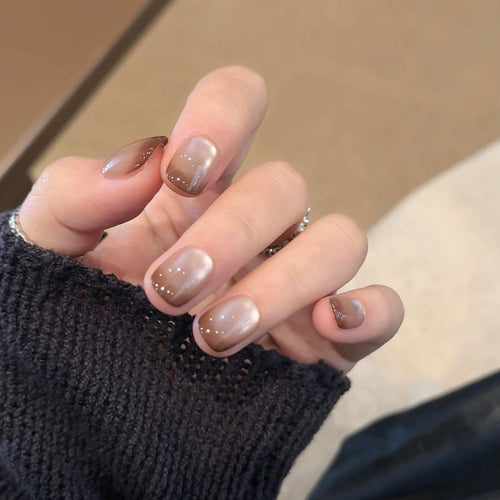 Artificial nails with elegant gradient color and glitter elements Bowlift