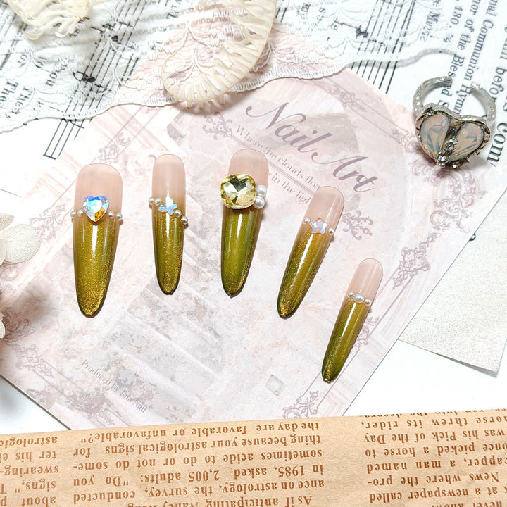 Artificial nails with Elegant Ombre Effect and Glitter Accents Bowlift