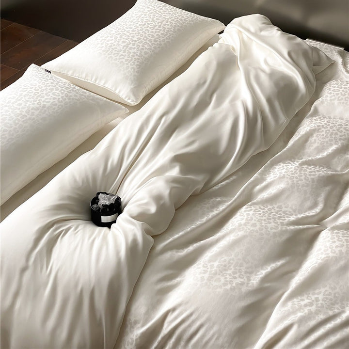 Satin bedding set with subtle leopard jacquard texture and silky feel