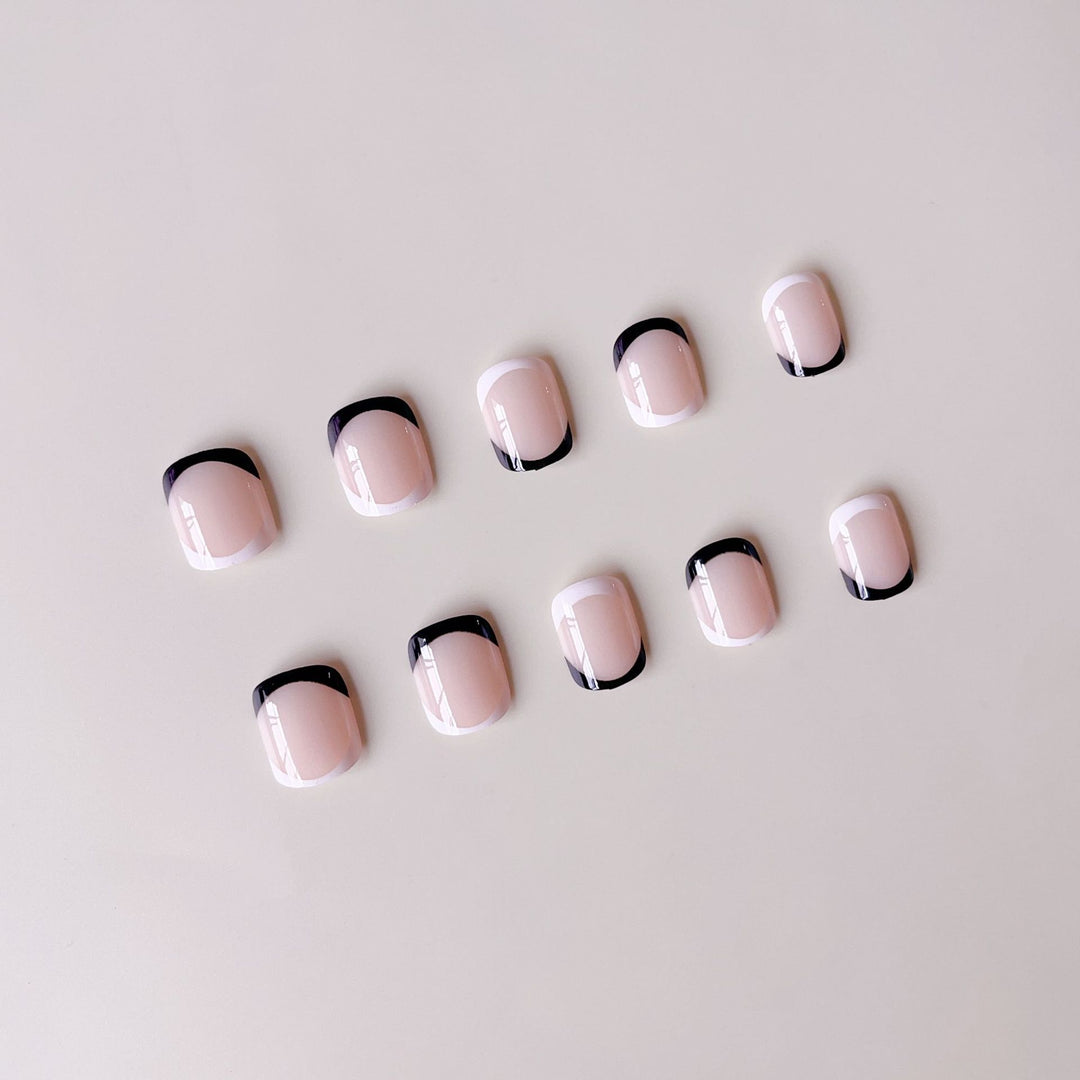 Acrylic Nail Set with Elegant French Design and Black Accent Bowlift