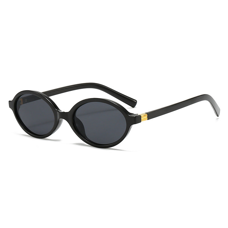 Women's fashionable oval glasses with golden accents Bowlift