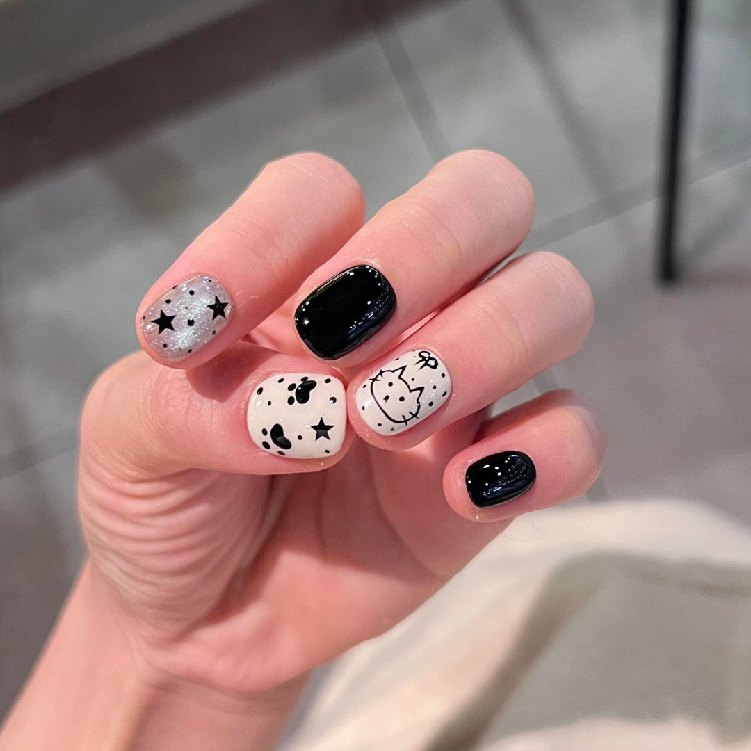 Artificial nails with cat and star design Bowlift