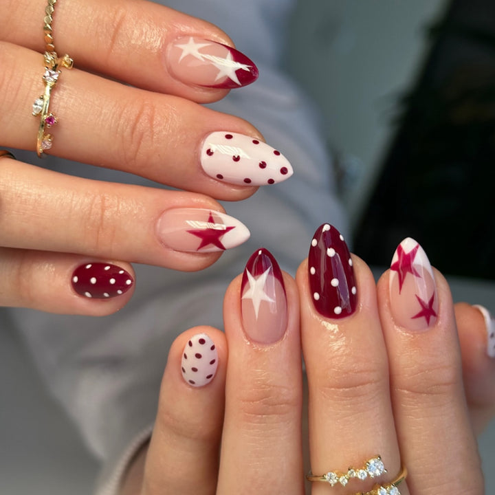 Artificial nail art with playful dots and bows Bowlift